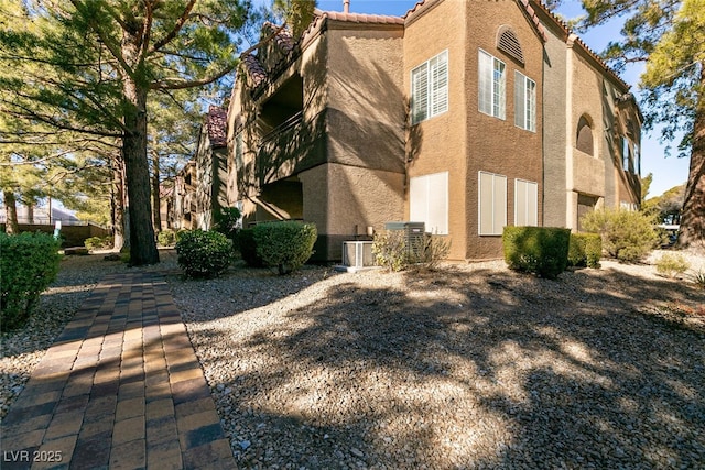 view of property featuring cooling unit