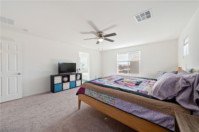 bedroom with ceiling fan, carpet flooring, and multiple windows