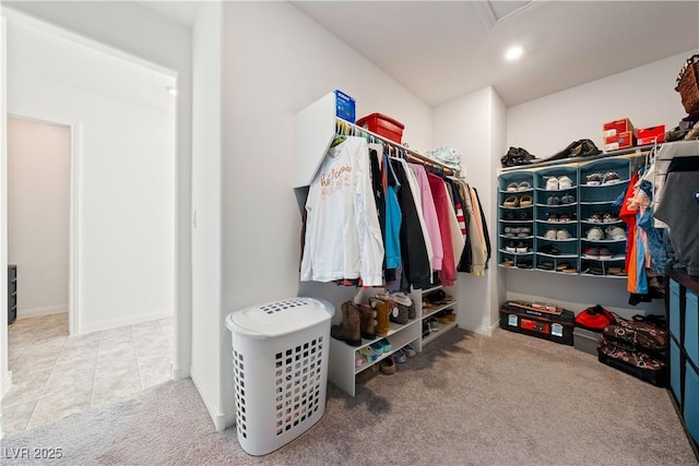 spacious closet featuring carpet floors