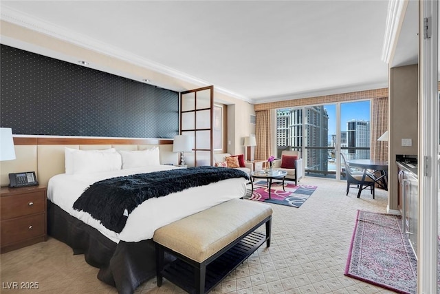 carpeted bedroom featuring crown molding