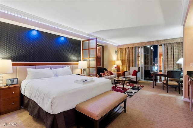 bedroom featuring crown molding and light colored carpet