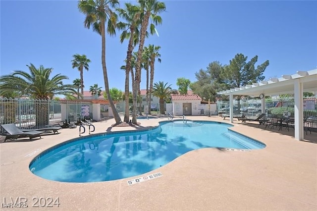 view of pool featuring a pergola and a patio area