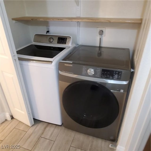 laundry area featuring washer and clothes dryer