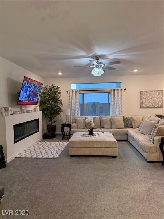 living room featuring light carpet and ceiling fan