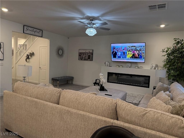 living room with ceiling fan