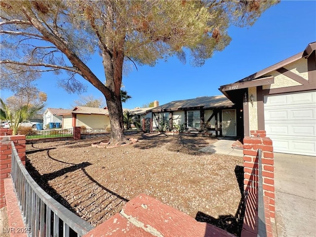 view of yard featuring a garage