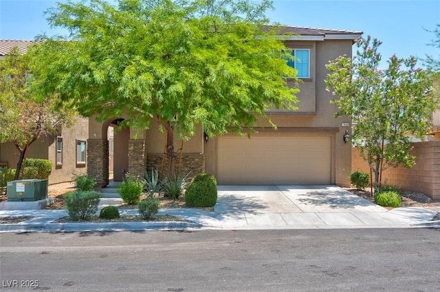 view of front of property with central AC and a garage