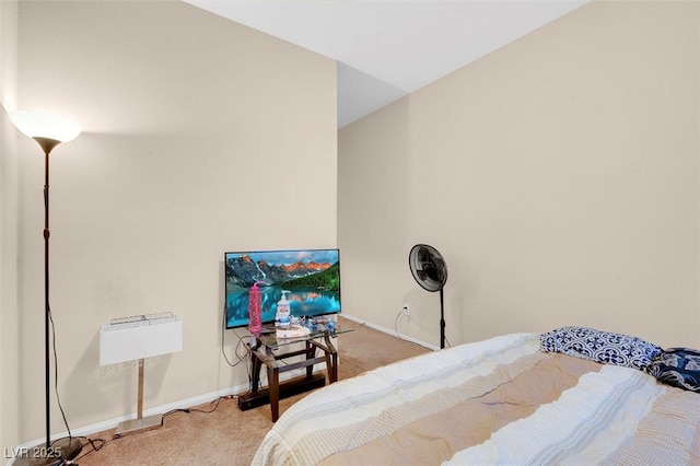 bedroom with light colored carpet