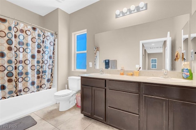 full bathroom with toilet, vanity, tile patterned floors, and shower / bathtub combination with curtain