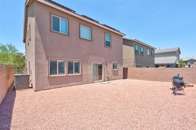 back of property featuring a patio and central air condition unit