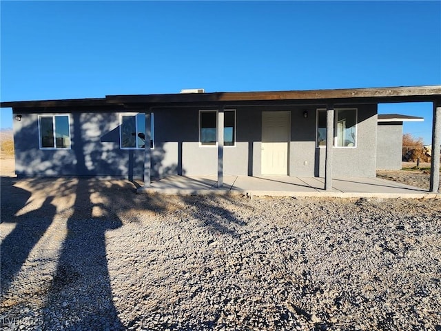 view of front facade featuring a patio area