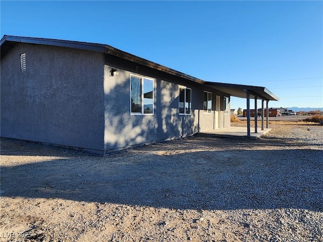 view of home's exterior featuring a patio area