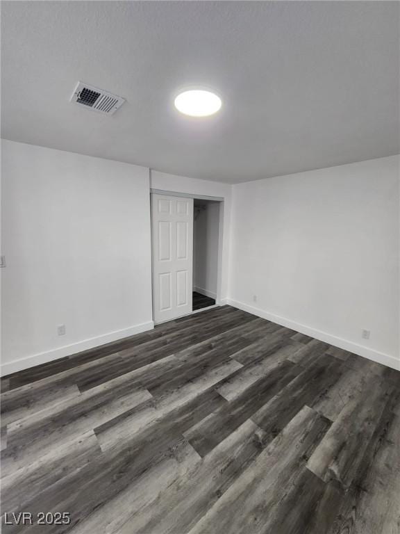 interior space featuring dark wood-type flooring