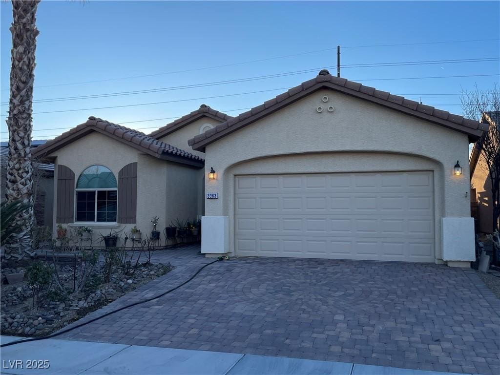 view of front of home with a garage