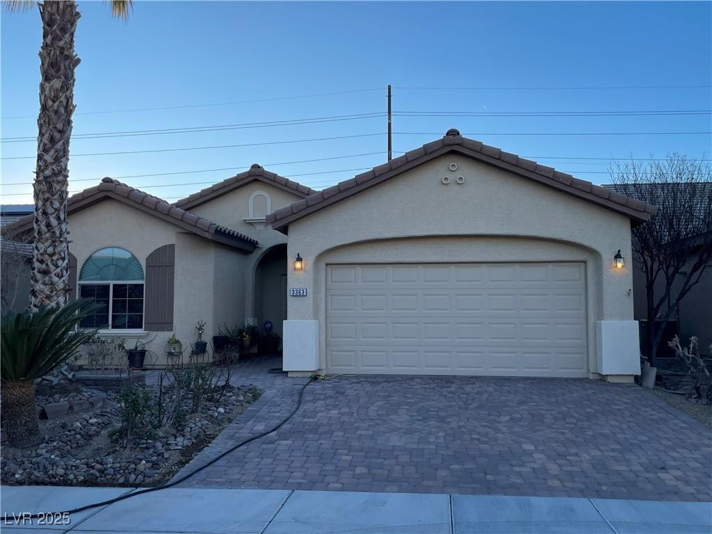 view of front of property with a garage