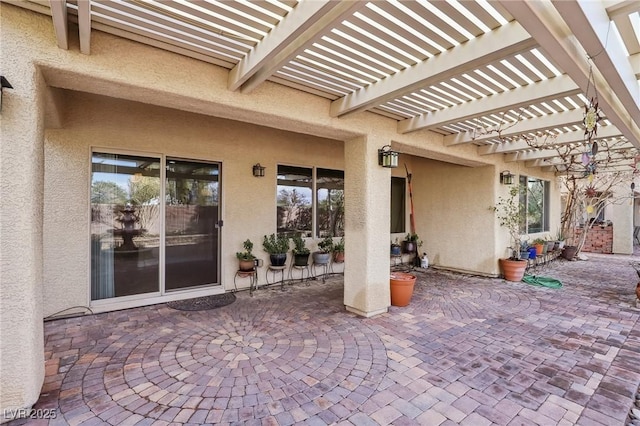 view of patio featuring a pergola