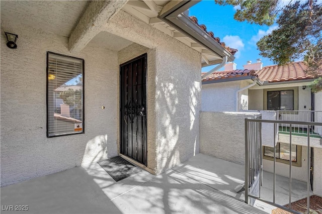 doorway to property with a balcony