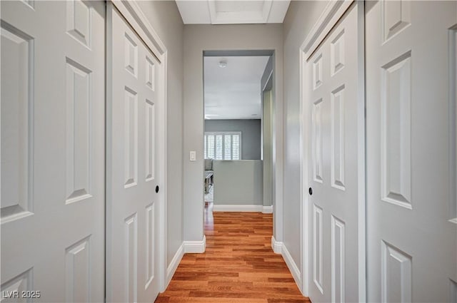 corridor featuring light wood-type flooring