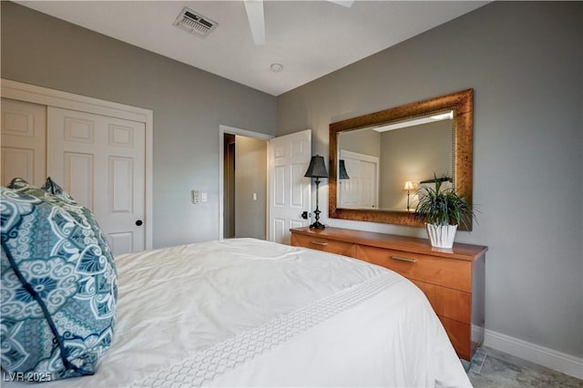 bedroom featuring ceiling fan and a closet