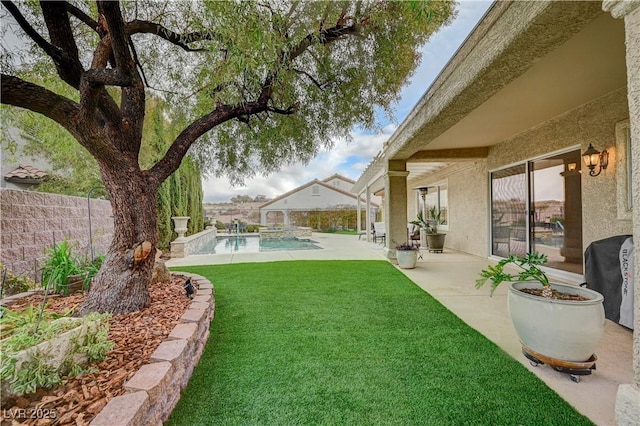 view of yard with a patio area