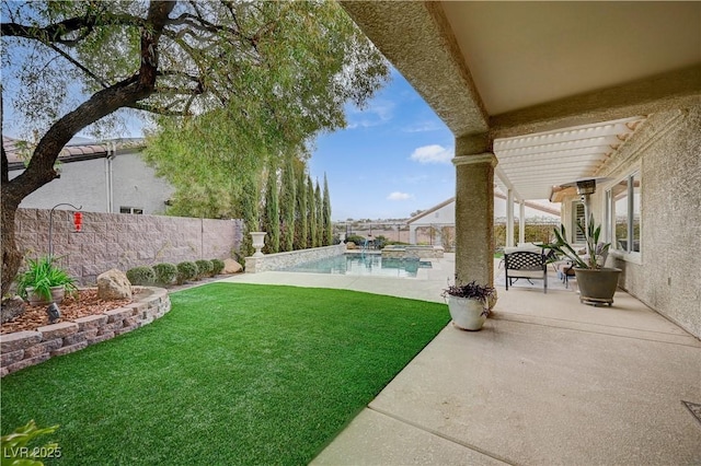 view of yard featuring a fenced in pool and a patio area