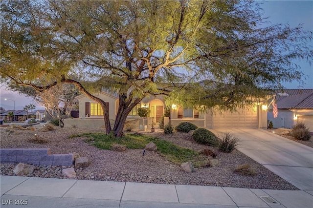 obstructed view of property with a garage