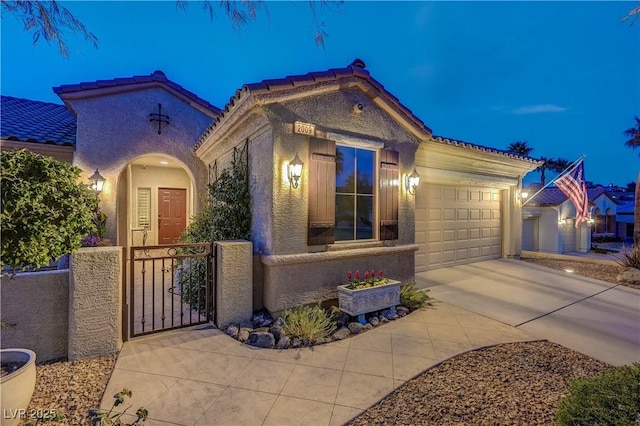 view of front of home with a garage