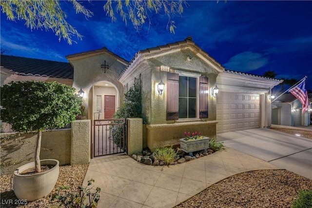 view of front of home featuring a garage