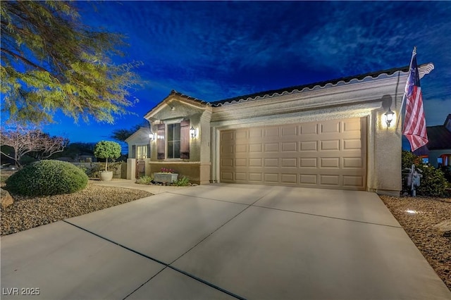 view of front of home with a garage