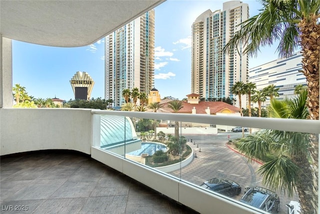 balcony featuring a city view