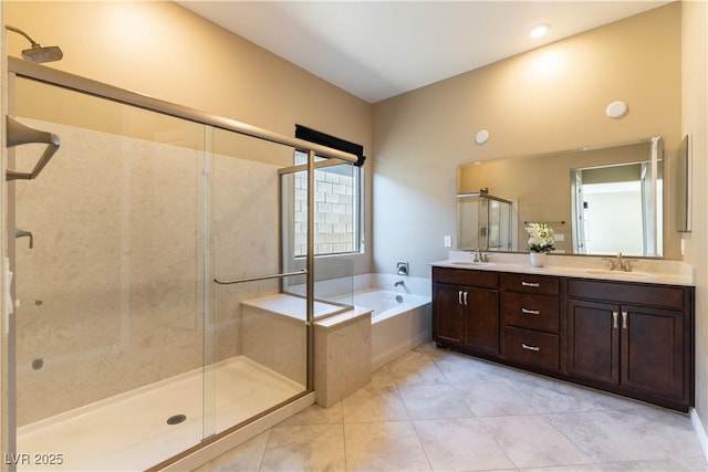 bathroom featuring vanity, tile patterned floors, and plus walk in shower