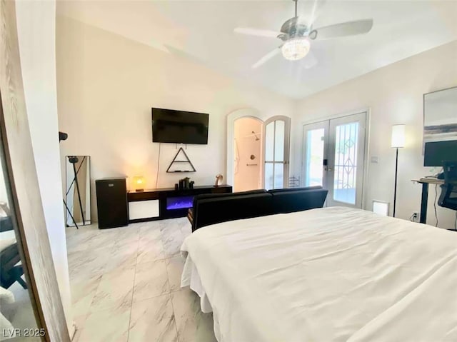 bedroom with ceiling fan, french doors, and access to exterior