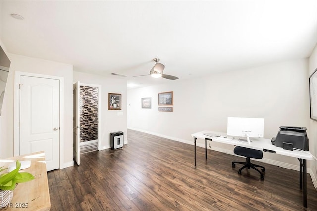 home office featuring ceiling fan and dark hardwood / wood-style floors