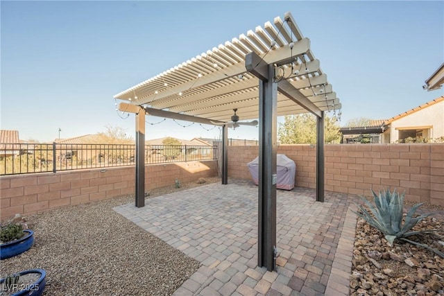 view of patio / terrace featuring area for grilling and a pergola