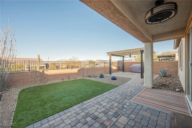 view of patio featuring a pergola