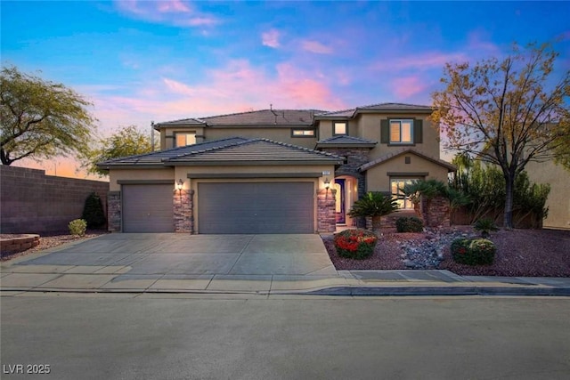 view of front of home with a garage