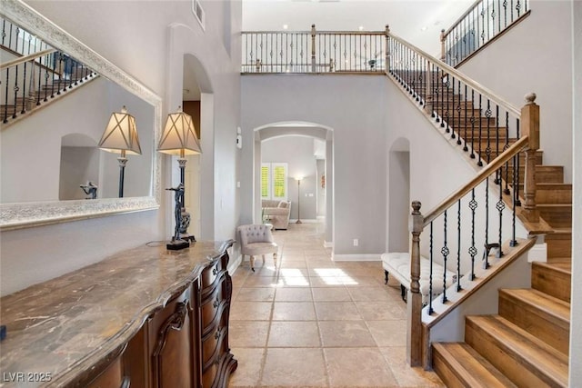 entryway with a high ceiling