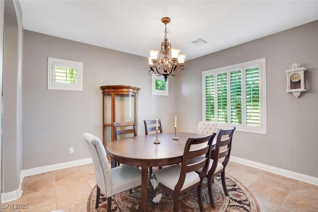 dining room featuring an inviting chandelier