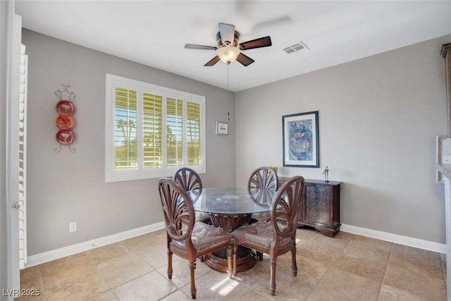 dining area with ceiling fan