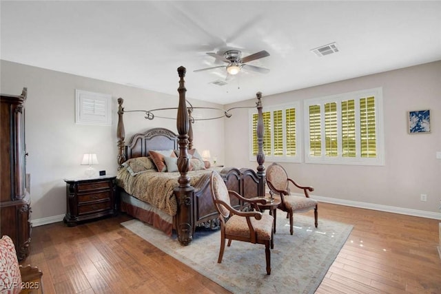 bedroom with ceiling fan and hardwood / wood-style floors