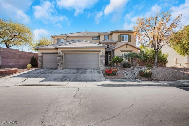 view of front of home with a garage