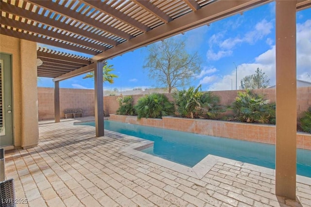 view of swimming pool featuring a pergola and a patio area