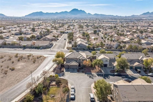 drone / aerial view featuring a mountain view