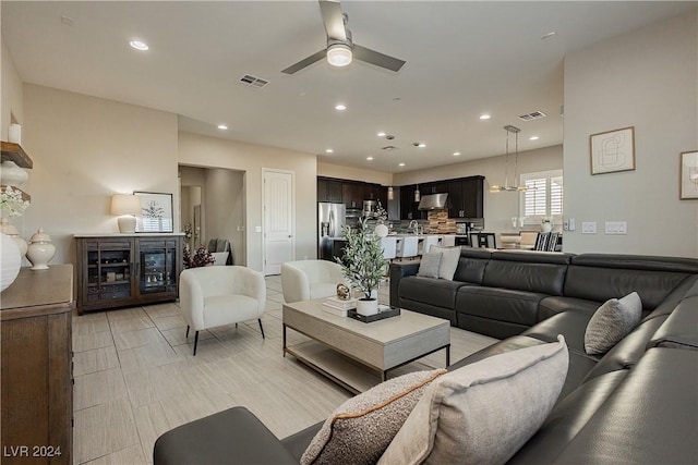 living room featuring ceiling fan