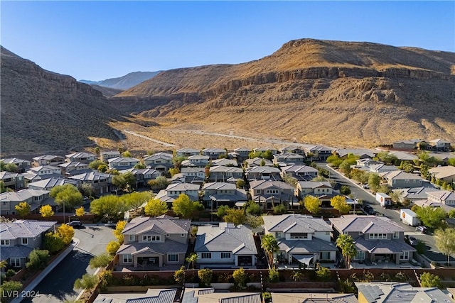 drone / aerial view featuring a mountain view