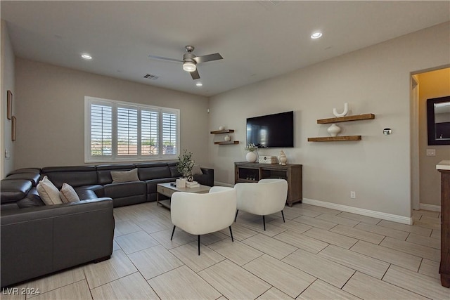 living room featuring ceiling fan