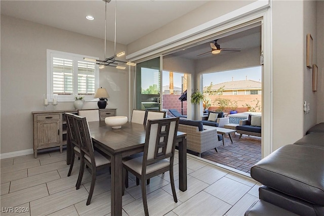 dining area with ceiling fan