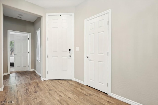 foyer featuring light hardwood / wood-style floors