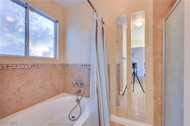 bathroom featuring plus walk in shower