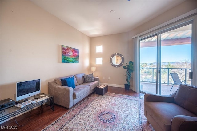 living room with dark hardwood / wood-style flooring